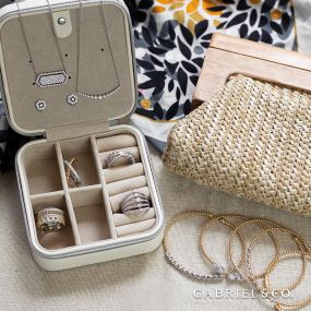 Protect your jewelry by placing items inside a soft, compact jewelry box from Gabriel & Co.