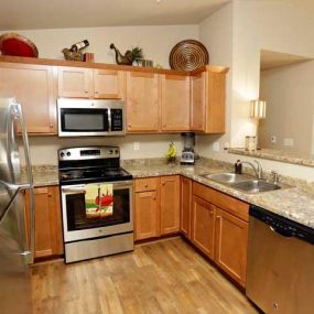 The Glade Apartments Kitchen with Black Appliances