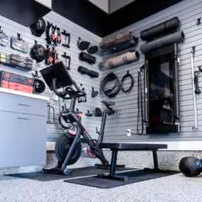 Show us your stuff and we'll show you how you can organize even the most cluttered garage. Whether you're interested in slatwall for hanging, custom garage cabinets for concealing, or overhead storage to just get something out of the way, we've got you covered. Combine your storage with our gorgeous