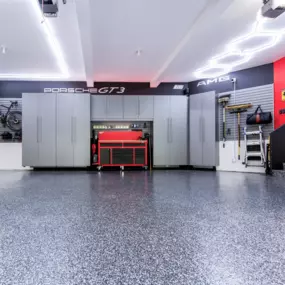 Custom Garage Makeover for Car Enthusiasts – Epoxy Floors & Premium Storage in Southern Maine This garage is every car lover’s dream. With sleek, high-performance epoxy flooring, custom garage cabinets, and a built-in workstation, this space is designed to showcase your passion while keeping everyth