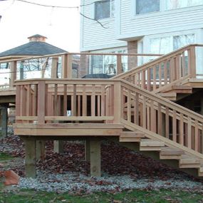 At Customdecks.com, we can design and install wood decking that’s not only beautiful but functional for the whole family. From the initial consultation and design, to permit applications and association approvals, on through construction and cleanup- we handle the entire process of your project.