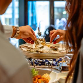 Grab fresh happy hour oysters at our oyster bar