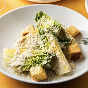 Jax Caesar Salad with little gems, croutons, whole grain mustard dressing, grana padano