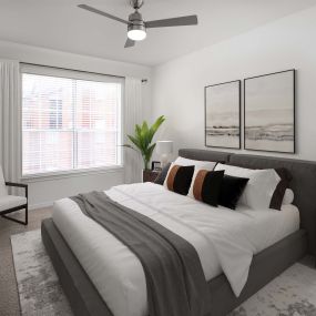 Renovated bedroom with modern ceiling fan and carpet at Camden Addison apartments in Addison, TX