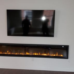 Ace Handyman Services installed an electric fire place and hung a smart TV in New Albany, Ohio.