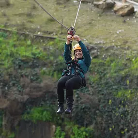 Experience the Big Gun Zip Lines at Quarry Park Adventures! Race side-by-side friends and family on three long and fast zip lines spanning the length of Big Gun Quarry.