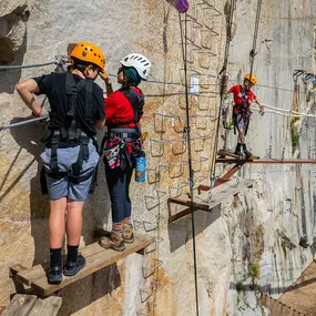 Italian for “iron path,” the Via Ferrata at Quarry Park Adventures is an amazing experience! From heights up to 40-feet above the quarry floor, adventurers scale the perimeter rock walls on a series of challenge elements, swinging bridges, and more.