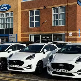 Evans Halshaw Ford Ashton Dealership Exterior with Three Ford Puma Cars