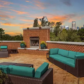 Rooftop terrace with fireplace overlooking uptown Charlotte