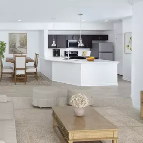 Open-concept living and dining area at Camden Preserve apartments in Tampa, FL