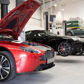 Cars inside the Aston Martin Wilmslow Service Centre