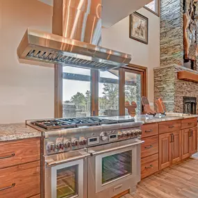 Cabinets are made of Black Walnut wood with a Natural Finish.