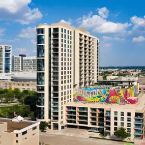 Exterior with mural and downtown