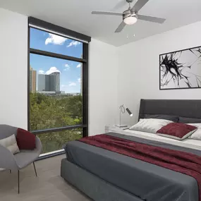 Bright contemporary finishes bedroom with skyline views