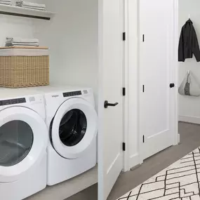 Laundry room with full size washer and dryer