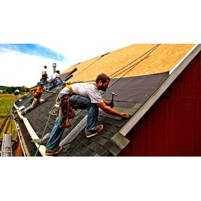 Crew Working on New Roofing