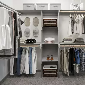 Spacious walk-in closet with built-in shelves at Camden Design District apartments in Dallas, TX