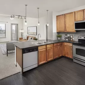 Two-bedroom kitchen with built-in desk at Camden Design District apartments in Dallas, TX