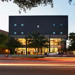 Exterior of leasing office and resident lounge at night