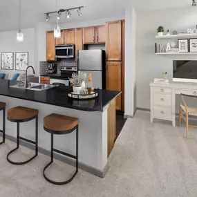 Kitchen with large island and space for a home office