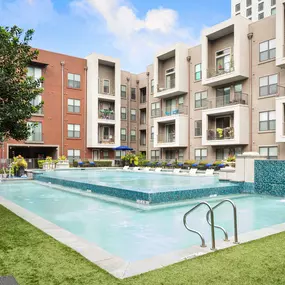 Resort style pool with water feature