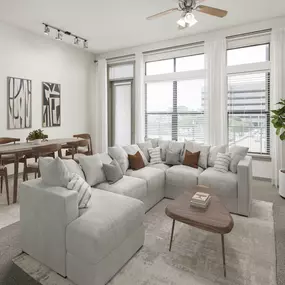 Living room with high ceilings and private balcony at Camden Design District apartments in Dallas, TX