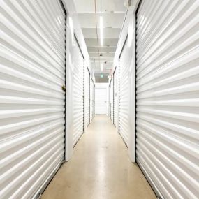 Broadway Station Self Storage indoor storage units in well lit hallway
