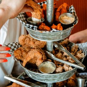 Gluten free fried chicken tower with chicken tenders, chicken wings, fried bird and more