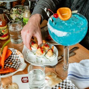 Join us for happy hour with big cocktails and fried chicken towers
