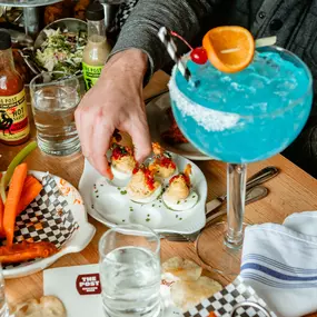 Join us for happy hour with big cocktails and fried chicken towers