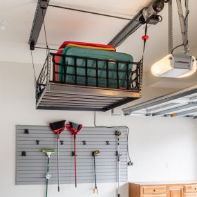 Motorized storage solutions for the garage remove the need for a ladder!