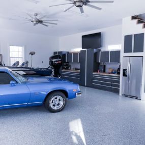 Let us help you take your garage to the next level!  Epoxy flooring, storage cabinets, slatwall, work top and overhead storage help keep your garage functional and attractive.