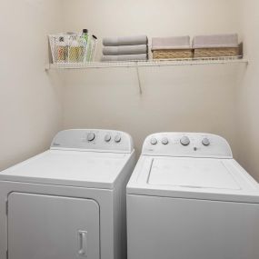 Full-size washer and dryer set at Camden Addison apartments in Addison, Tx