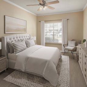 First-floor bedroom with wood-style flooring at Camden Legacy Creek apartments in Plano, TX