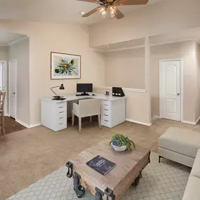 Top floor living room with carpet and space for a home office