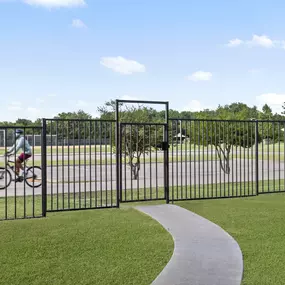 Direct access gate to Archgate Park and Bluebonnet Trail at Camden Legacy Creek apartments in Plano, TX