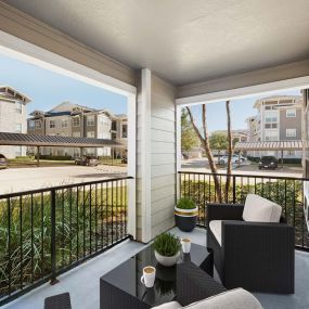 Private patio at Camden Northpointe Apartments in Tomball, TX