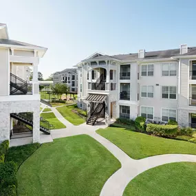 Exterior green space at Camden Northpointe Apartments in Tomball, TX