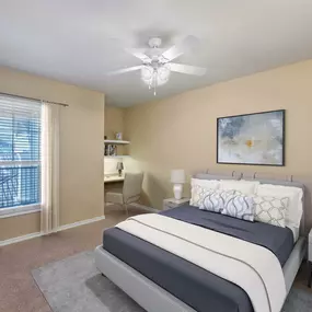 Bedroom with built in desk at Camden Northpointe Apartments in Tomball, TX