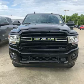 Jeff Wyler Chrysler Dodge Jeep Ram of Lawrenceburg, Indiana showcased in this photo featuring a powerful RAM truck on display, highlighting the dealership’s selection of new and used RAM models built for performance, durability, and capability.