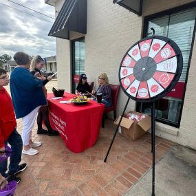 Our event has started!! Come spin the wheel!! And also get candy and a small basketball!!