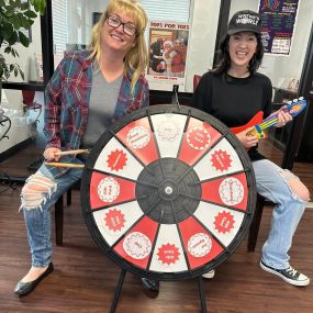 Our event has started!! Come spin the wheel!! And also get candy and a small basketball!!