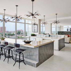 Sky lounge kitchen with skyline views