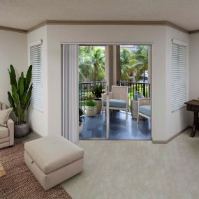 Living room, balcony, and home office at Camden Aventura.