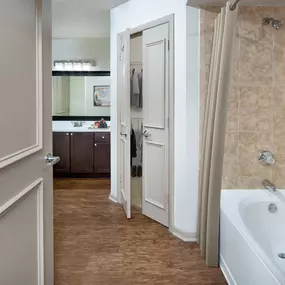 Luxury bathroom with walk in closet