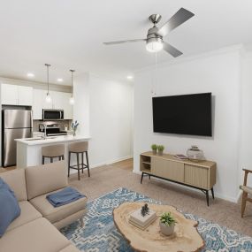 Renovated first floor living room and kitchen at Camden Stoneleigh apartments in Austin, Tx