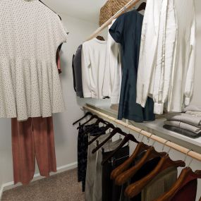 Walk-in closet with built-in shelves at Camden Stoneleigh apartments in Austin, Tx