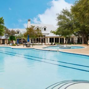 Spacious pool with lap lanes next to clubhouse at Camden Stoneleigh