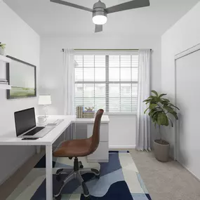 Den flex space office with closet, carpet, and ceiling fan at Camden Stoneleigh apartments in Austin, TX