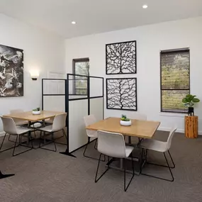 Community workspace with room dividers at Camden Stoneleigh apartments in Austin, TX